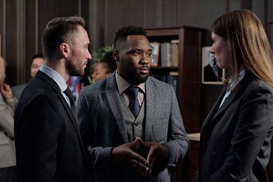 group of people in suit